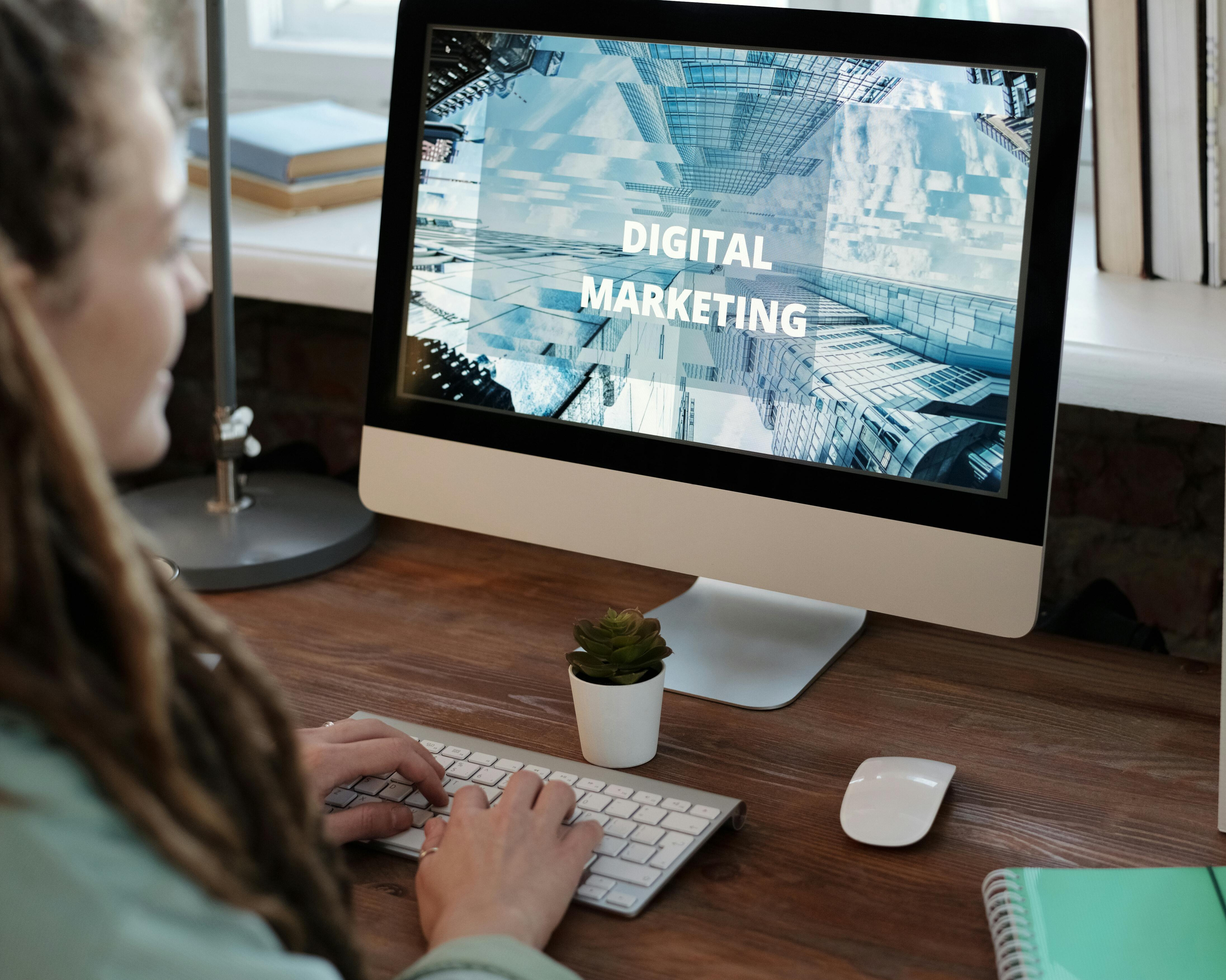 A person working at a desk on a computer screen displaying "Digital Marketing," representing the growing opportunities and flexibility of careers in the digital marketing field.